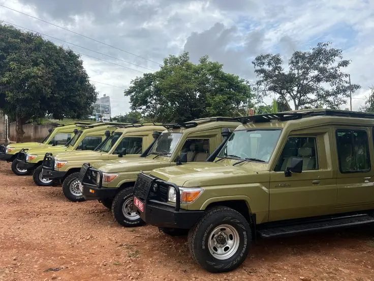 A fleet of Nile Abenteuer safari vehicles Uganda Safaris