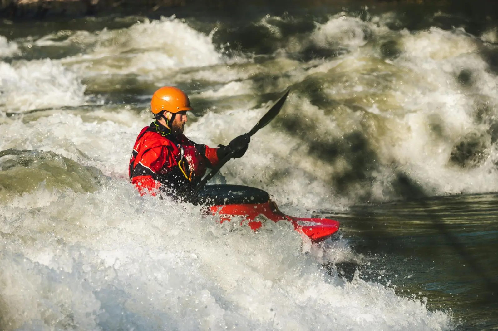 A tourist doing white water rafting in Jinja - Uganda Adventure tours Uganda 2025