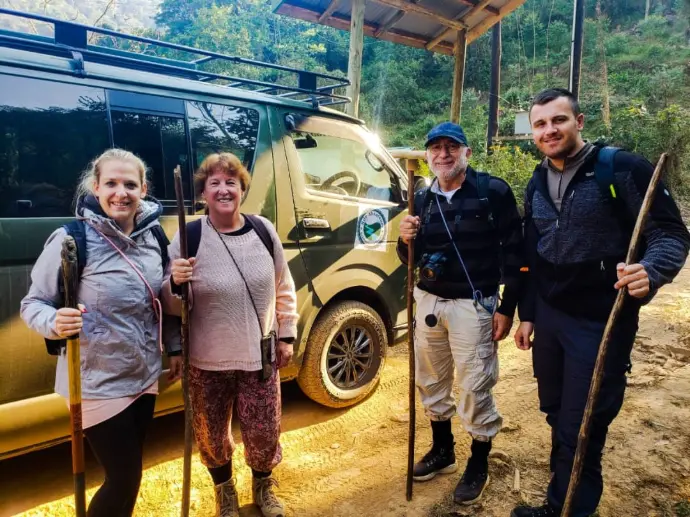 Happy tourists after gorilla trekking When to visit Bwindi