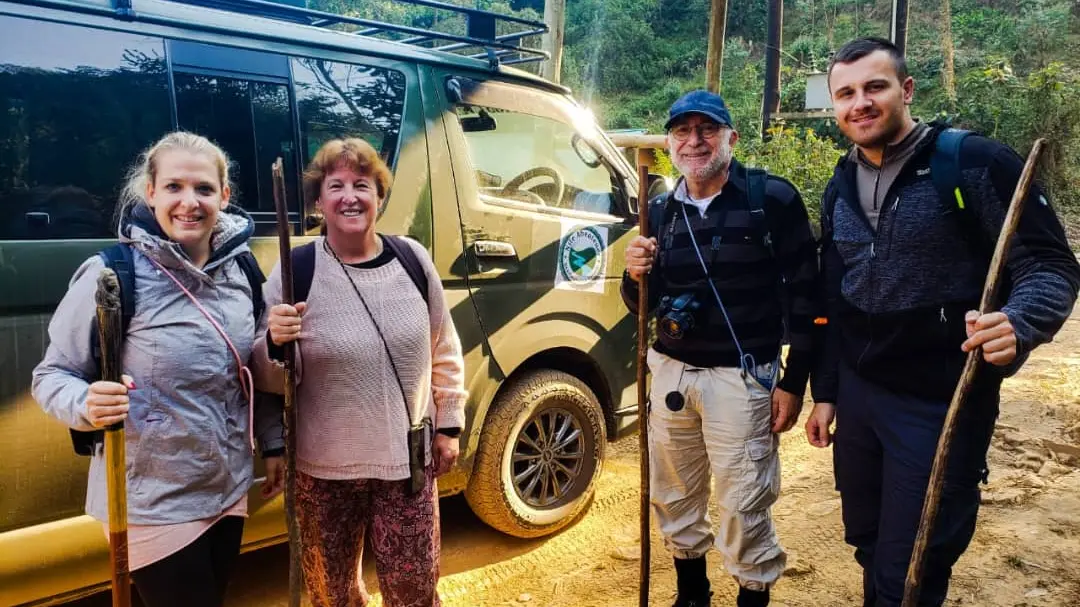 A group of happy tourists after trekking mountain gorilla in Bwindi Best gorilla trekking time Uganda