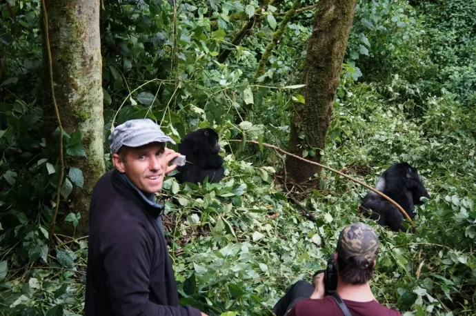 Tourists on a gorilla trekking adventure Tourists on a gorilla trekking adventure